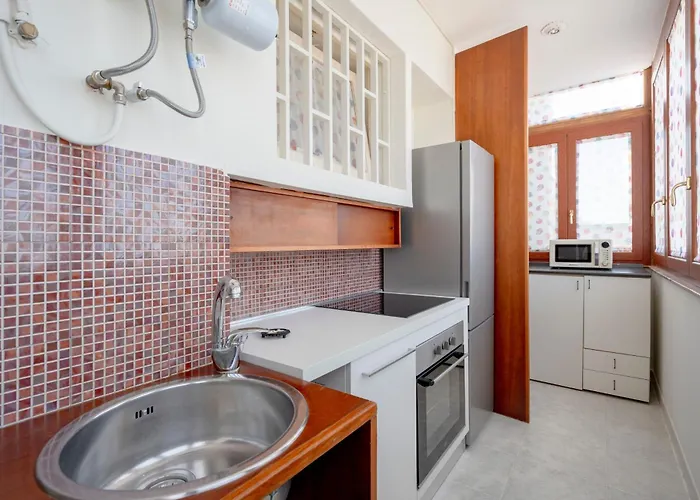 Guesthost - Dimora Dall'alto Apartment